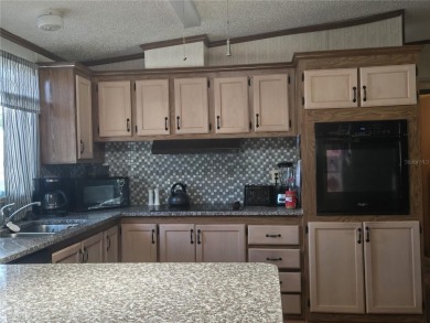 REDUCED! ZELLWOOD STATION MOTIVATED SELLER will entertain all on Zellwood Station Country Club in Florida - for sale on GolfHomes.com, golf home, golf lot