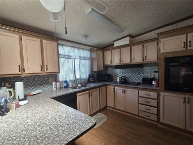 REDUCED! ZELLWOOD STATION MOTIVATED SELLER will entertain all on Zellwood Station Country Club in Florida - for sale on GolfHomes.com, golf home, golf lot