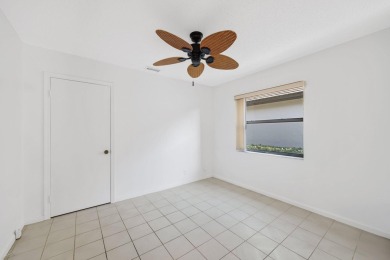 Discover the perfect blend of comfort and convenience within the on PGA National Golf Club in Florida - for sale on GolfHomes.com, golf home, golf lot