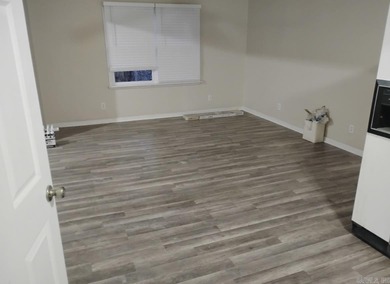 Charming 3-bedroom, 2-bath ranch-style home in the heart of on Cherokee Village North Course in Arkansas - for sale on GolfHomes.com, golf home, golf lot