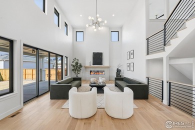 Entertainer's delight perched on a premier .25-acre lot in the on Coal Creek Golf Course in Colorado - for sale on GolfHomes.com, golf home, golf lot