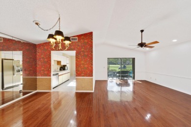 Discover the perfect blend of comfort and convenience within the on PGA National Golf Club in Florida - for sale on GolfHomes.com, golf home, golf lot