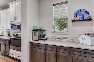 Discover comfort, style, and privacy in this beautifully on Wildhorse Golf Club of Robson Ranch in Texas - for sale on GolfHomes.com, golf home, golf lot