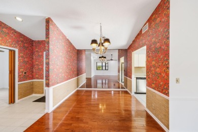 Discover the perfect blend of comfort and convenience within the on PGA National Golf Club in Florida - for sale on GolfHomes.com, golf home, golf lot