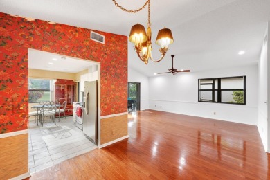 Discover the perfect blend of comfort and convenience within the on PGA National Golf Club in Florida - for sale on GolfHomes.com, golf home, golf lot