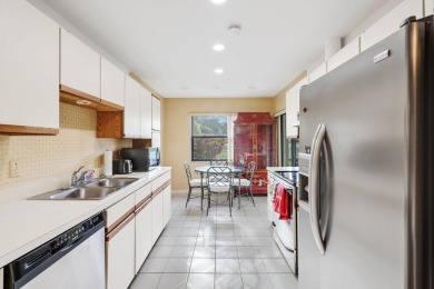 Discover the perfect blend of comfort and convenience within the on PGA National Golf Club in Florida - for sale on GolfHomes.com, golf home, golf lot
