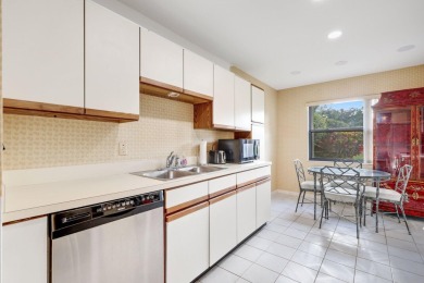 Discover the perfect blend of comfort and convenience within the on PGA National Golf Club in Florida - for sale on GolfHomes.com, golf home, golf lot