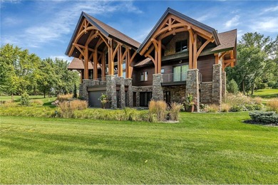 Enjoy the epitome of luxury living on the 16th & 17th hole at on St. Cloud Country Club in Minnesota - for sale on GolfHomes.com, golf home, golf lot