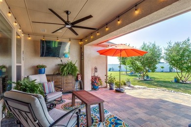 Discover comfort, style, and privacy in this beautifully on Wildhorse Golf Club of Robson Ranch in Texas - for sale on GolfHomes.com, golf home, golf lot