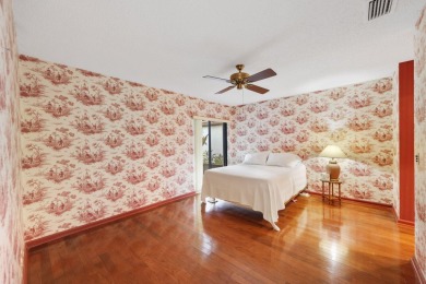Discover the perfect blend of comfort and convenience within the on PGA National Golf Club in Florida - for sale on GolfHomes.com, golf home, golf lot