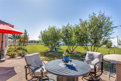 Discover comfort, style, and privacy in this beautifully on Wildhorse Golf Club of Robson Ranch in Texas - for sale on GolfHomes.com, golf home, golf lot