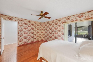 Discover the perfect blend of comfort and convenience within the on PGA National Golf Club in Florida - for sale on GolfHomes.com, golf home, golf lot