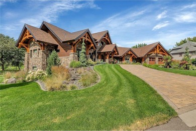 Enjoy the epitome of luxury living on the 16th & 17th hole at on St. Cloud Country Club in Minnesota - for sale on GolfHomes.com, golf home, golf lot