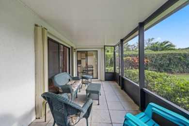 Discover the perfect blend of comfort and convenience within the on PGA National Golf Club in Florida - for sale on GolfHomes.com, golf home, golf lot