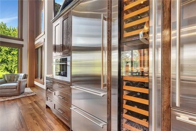 Enjoy the epitome of luxury living on the 16th & 17th hole at on St. Cloud Country Club in Minnesota - for sale on GolfHomes.com, golf home, golf lot