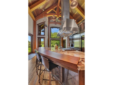 Enjoy the epitome of luxury living on the 16th & 17th hole at on St. Cloud Country Club in Minnesota - for sale on GolfHomes.com, golf home, golf lot