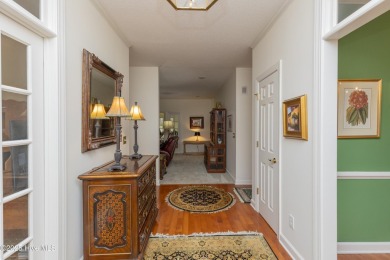 Situated in a peaceful cul-de-sac, this home sits on a large 2 on Pinewild Country Club of Pinehurst in North Carolina - for sale on GolfHomes.com, golf home, golf lot