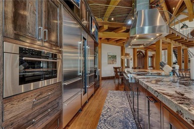 Enjoy the epitome of luxury living on the 16th & 17th hole at on St. Cloud Country Club in Minnesota - for sale on GolfHomes.com, golf home, golf lot