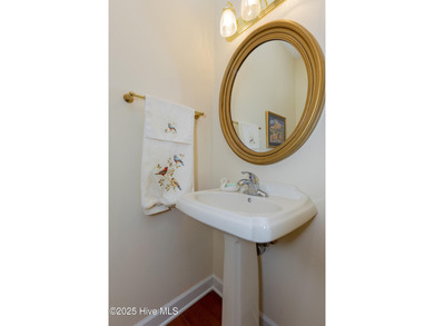 Situated in a peaceful cul-de-sac, this home sits on a large 2 on Pinewild Country Club of Pinehurst in North Carolina - for sale on GolfHomes.com, golf home, golf lot