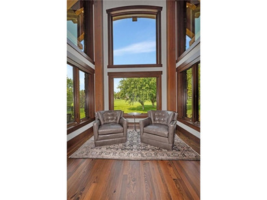 Enjoy the epitome of luxury living on the 16th & 17th hole at on St. Cloud Country Club in Minnesota - for sale on GolfHomes.com, golf home, golf lot