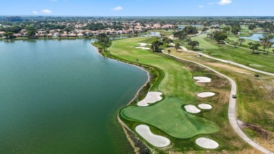 Discover the perfect blend of comfort and convenience within the on PGA National Golf Club in Florida - for sale on GolfHomes.com, golf home, golf lot