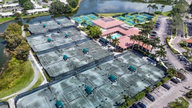 Discover the perfect blend of comfort and convenience within the on PGA National Golf Club in Florida - for sale on GolfHomes.com, golf home, golf lot