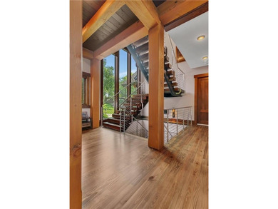 Enjoy the epitome of luxury living on the 16th & 17th hole at on St. Cloud Country Club in Minnesota - for sale on GolfHomes.com, golf home, golf lot