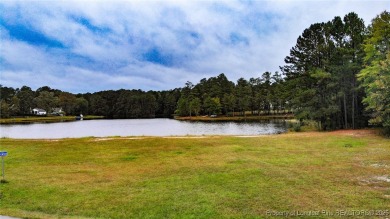 Beautiful wooded 0.34-acre lot located in the desirable Carolina on Carolina Lakes Country Club in North Carolina - for sale on GolfHomes.com, golf home, golf lot