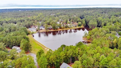 Beautiful wooded 0.34-acre lot located in the desirable Carolina on Carolina Lakes Country Club in North Carolina - for sale on GolfHomes.com, golf home, golf lot