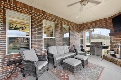 Experience elevated living in Cedar Hill's prestigious Lake on Tangle Ridge Golf Club in Texas - for sale on GolfHomes.com, golf home, golf lot