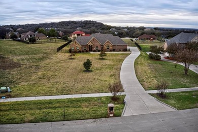 Experience elevated living in Cedar Hill's prestigious Lake on Tangle Ridge Golf Club in Texas - for sale on GolfHomes.com, golf home, golf lot