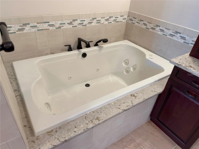 One or more photo(s) has been virtually staged. *** MOVE-IN on Treasure Bay Golf and Tennis in Florida - for sale on GolfHomes.com, golf home, golf lot