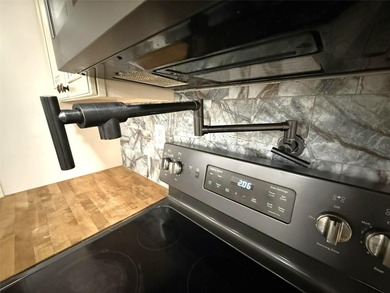 Short Sale. This LARGE 4/2/2 pool home sits on a peaceful on Port Charlotte Golf Club in Florida - for sale on GolfHomes.com, golf home, golf lot