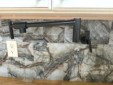 Short Sale. This LARGE 4/2/2 pool home sits on a peaceful on Port Charlotte Golf Club in Florida - for sale on GolfHomes.com, golf home, golf lot