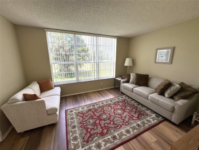 Beautifully updated 2BR/2BA condo in lush Palm Aire with on Palm-Aire Country Club and Resort - The Oaks in Florida - for sale on GolfHomes.com, golf home, golf lot