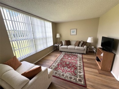 Beautifully updated 2BR/2BA condo in lush Palm Aire with on Palm-Aire Country Club and Resort - The Oaks in Florida - for sale on GolfHomes.com, golf home, golf lot