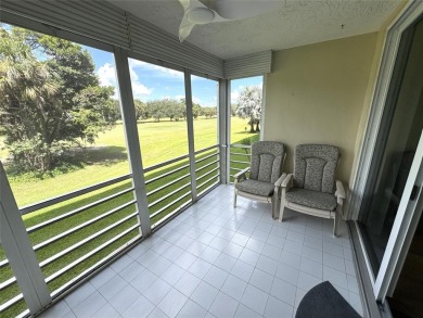 Beautifully updated 2BR/2BA condo in lush Palm Aire with on Palm-Aire Country Club and Resort - The Oaks in Florida - for sale on GolfHomes.com, golf home, golf lot