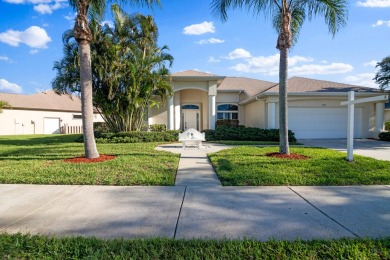 Overlooking the 10th green in the highly desired Viera East Golf on Viera East Golf Club in Florida - for sale on GolfHomes.com, golf home, golf lot