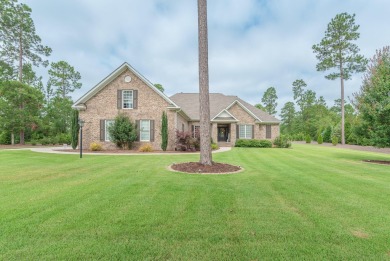 This luxurious residence features an open-concept floor plan on The Golf Club At Cedar Creek in South Carolina - for sale on GolfHomes.com, golf home, golf lot