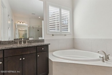 This luxury four bedroom, three bath upgraded home on a wooded on Amelia National Golf and Country Club in Florida - for sale on GolfHomes.com, golf home, golf lot