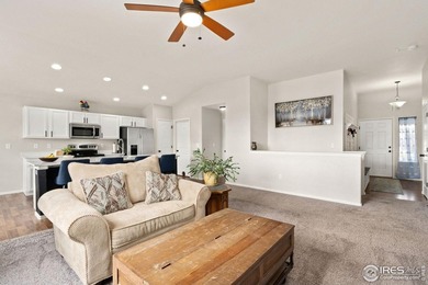 Fabulous ranch-style home with incredible mountain views backing on Raindance National Golf Course in Colorado - for sale on GolfHomes.com, golf home, golf lot