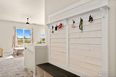 Fabulous ranch-style home with incredible mountain views backing on Raindance National Golf Course in Colorado - for sale on GolfHomes.com, golf home, golf lot