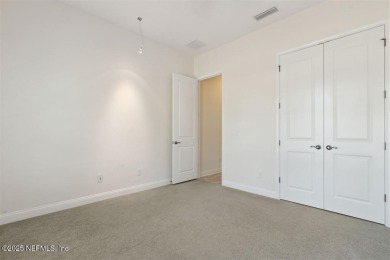 This luxury four bedroom, three bath upgraded home on a wooded on Amelia National Golf and Country Club in Florida - for sale on GolfHomes.com, golf home, golf lot