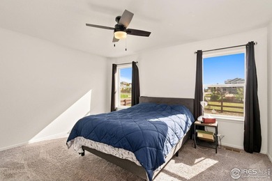 Fabulous ranch-style home with incredible mountain views backing on Raindance National Golf Course in Colorado - for sale on GolfHomes.com, golf home, golf lot