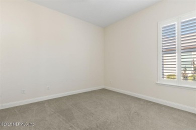 This luxury four bedroom, three bath upgraded home on a wooded on Amelia National Golf and Country Club in Florida - for sale on GolfHomes.com, golf home, golf lot