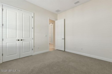 This luxury four bedroom, three bath upgraded home on a wooded on Amelia National Golf and Country Club in Florida - for sale on GolfHomes.com, golf home, golf lot