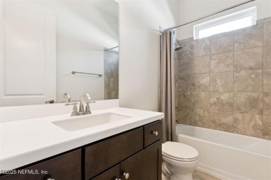 This luxury four bedroom, three bath upgraded home on a wooded on Amelia National Golf and Country Club in Florida - for sale on GolfHomes.com, golf home, golf lot