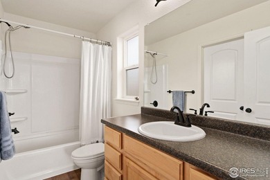 Fabulous ranch-style home with incredible mountain views backing on Raindance National Golf Course in Colorado - for sale on GolfHomes.com, golf home, golf lot