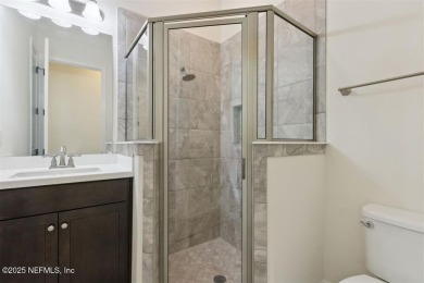 This luxury four bedroom, three bath upgraded home on a wooded on Amelia National Golf and Country Club in Florida - for sale on GolfHomes.com, golf home, golf lot
