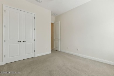This luxury four bedroom, three bath upgraded home on a wooded on Amelia National Golf and Country Club in Florida - for sale on GolfHomes.com, golf home, golf lot